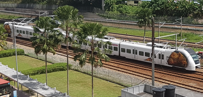 KLIA Ekspres train as seen from the pedestrian bridge connecting the three Bandar Tasik Selatan (BTS) train stations with the Terminal Bersepadu Selatan (TBS) express bus hub.