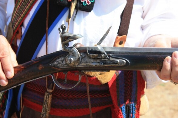 The lock of the flintlock gun (or perhaps a percussion gun) that everyone who worked in the fur trade carried and used. 