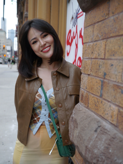 Girl in brown jacket 