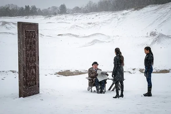 A shot of Philippa Georgiou and Michael Burnham meeting Carl at the Guardian of Forever