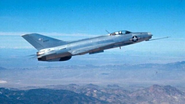 A captured MiG-21 in flight, from the right