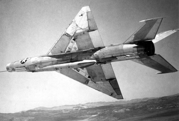 A captured MiG-21 in the air, from below