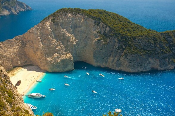 What is the best time of day to go to the Navagio beach