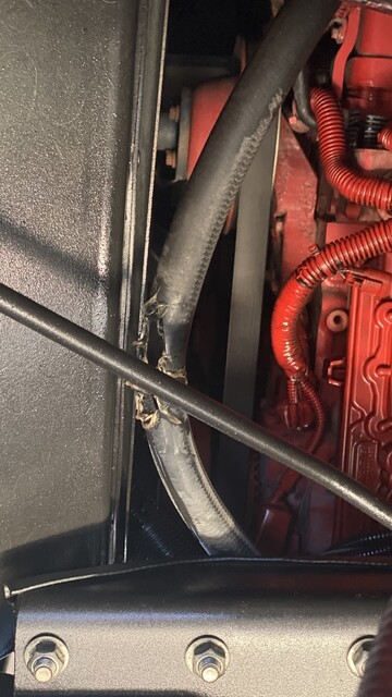 Blown/torn surge tank hose