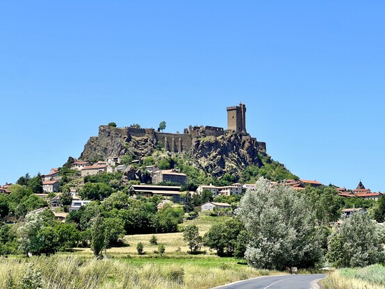 View of Polignac village on the top of the mountain 