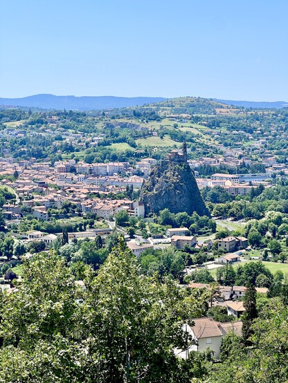 View on Le Puy en Velay with this particular church on the top of a mountain (Saint Michel d'Aiguilhe)