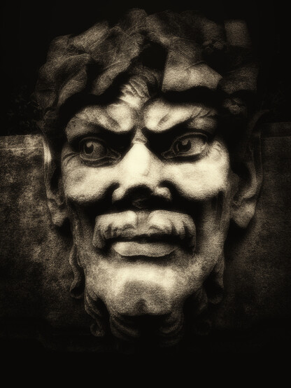 A grotesque gargoyle face carved out of stone that I came across in an architectural salvage yard. Dating back to at least the roman times these fantastical grotesque carvings were used to decorate buildings and temples.