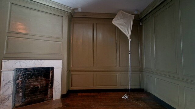 A room with Benjamin Franklin's kite experiment set up.