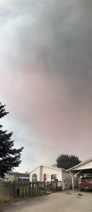 Smoke plume from a wildfire out at Adam’s Lake in British Columbia Canada seen from Salmon Arm BC