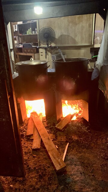 Cooked in large pots over wood fires.  
