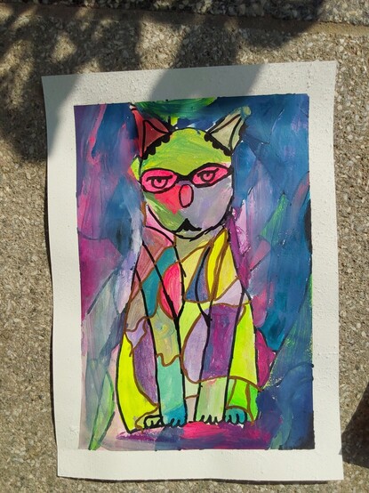 Gemaltes Bild einer sehr bunt gekachelten Katze.