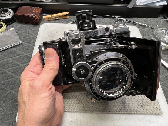Zeiss Ikon Super Ikonta 531/2 film camera, open, front view.