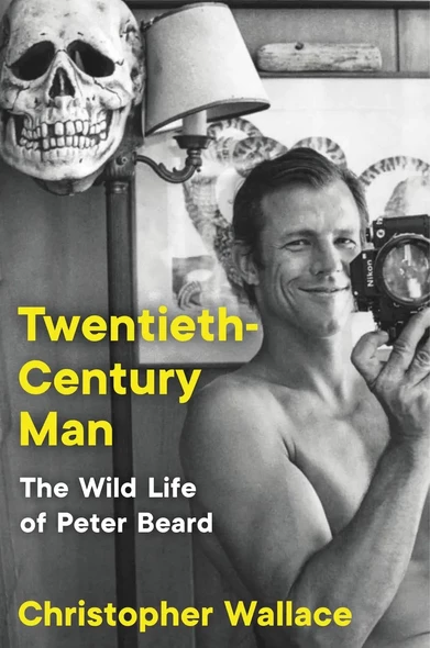 Black and white picture of shirtless Peter Beard taking a picture on a mirror, handsome, smiling, with a skull mask on the wall and a lamp. 
Big overlaid text in yellow: Twentieth-Century Man
Small overlaid text in white: The Wild Life of Peter Beard
Medium sized overlaid text in yellow: Christopher Wallace