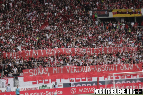 A banner in the stand of SC Freiburg which reads: “A fist instead of a kiss for Rubiales and Rummenigge. Sorry, with respect, that’s totally OK.”