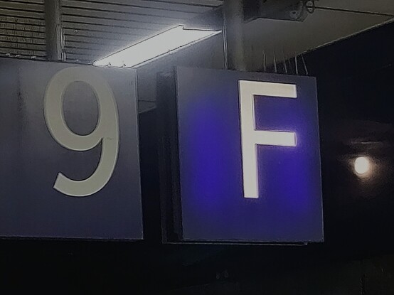 Picture from central station Hannover. Oh the picture there is the sign '9', another one with 'F' and after that the moon as a yellow dot.