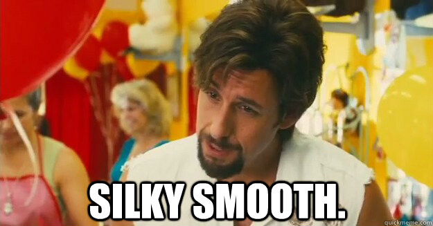 Frame from movie “Don’t mess with the Zohan” showing Zohan with inquisitive expression and subtitled “silky smooth”