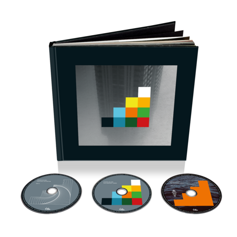 Image of the deluxe edition of Steven Wilson's "The Harmony Codex" hardback book-set with the three discs in front
