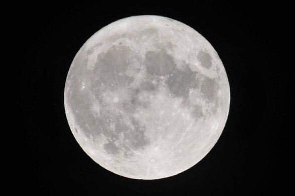 A full moon with black sky