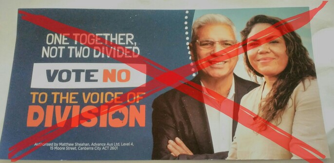 Anti-Voice propaganda reads: 
One Together, 
Not Two Divided
Vote No
To The Voice of Division
Authorised by Matthew Sheahan, Advance Aus Ltd, Level 4, 15 Moore Street, Canberra City ACT 2601
