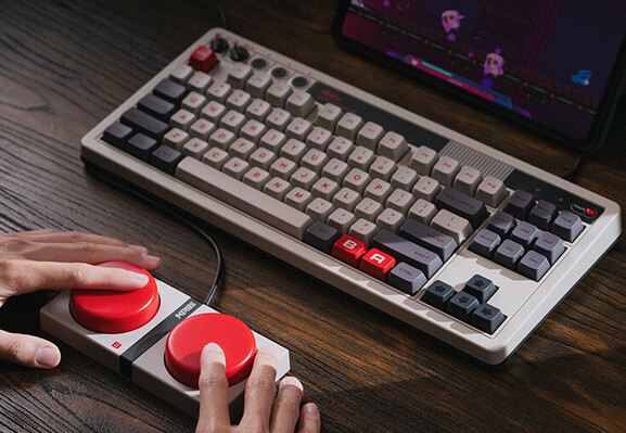 A mechanical keyboard. At the front of the image are two big buttons for fingers to SMASH