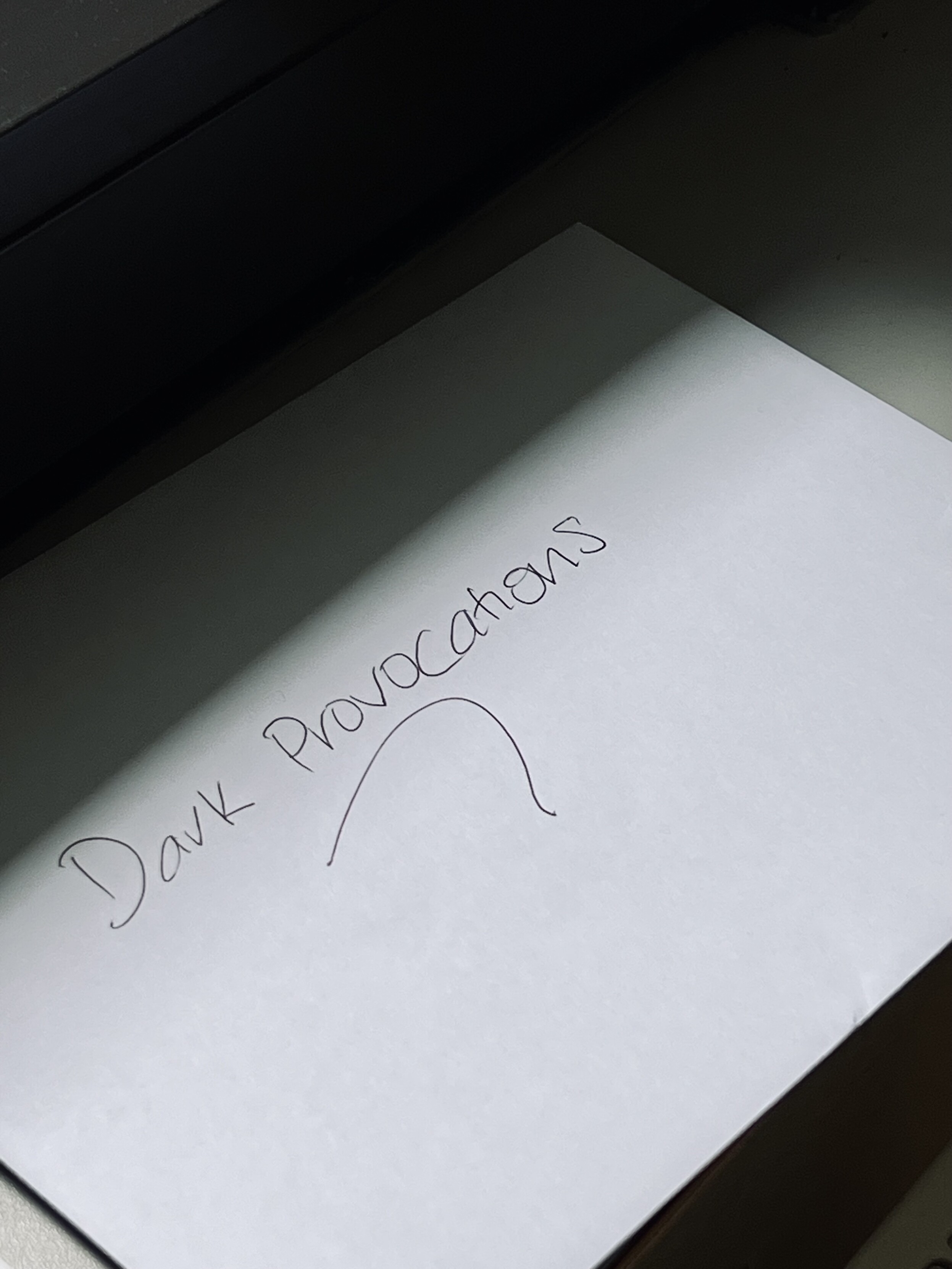 Envelope with „dark provocations“ written on it.