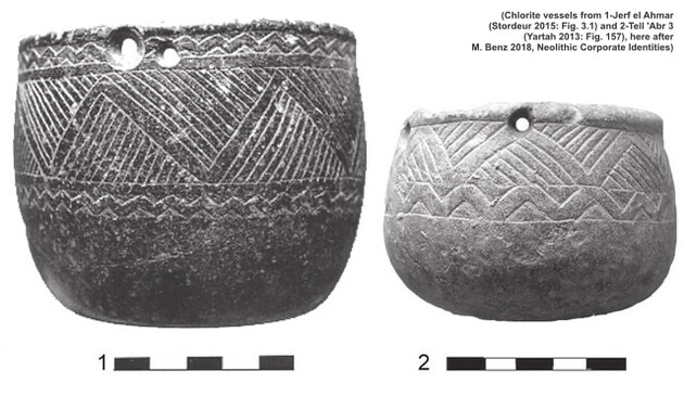 Photo of two stone vessels, bowl-like with perforations at the rim. They are decorated with patterns of triangles.