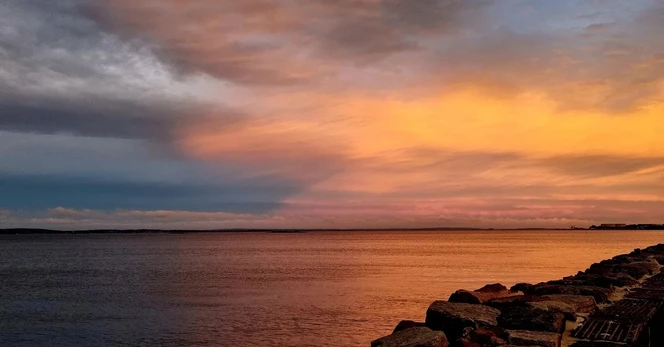 Dark orange and yellow and yellow sunset over the Oslofjord 