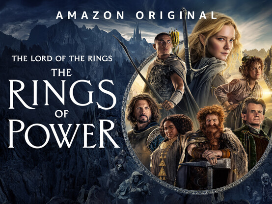 Rings of Power series poster, seven people on the right including two black characters. 