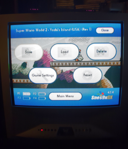 A CRT TV showing Snes9xGX running on the Nintendo Wii