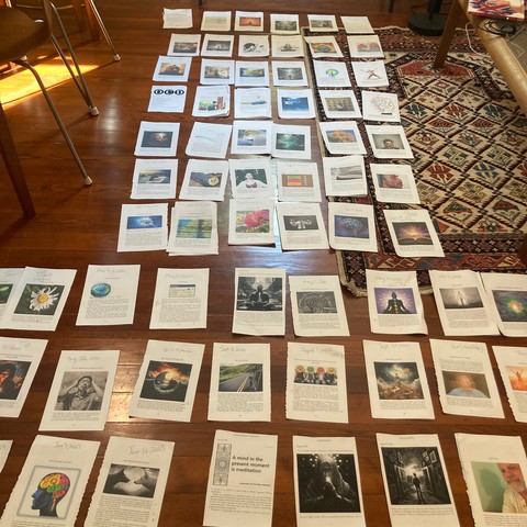 Dozens of pages from my upcoming book, spread out across the floor