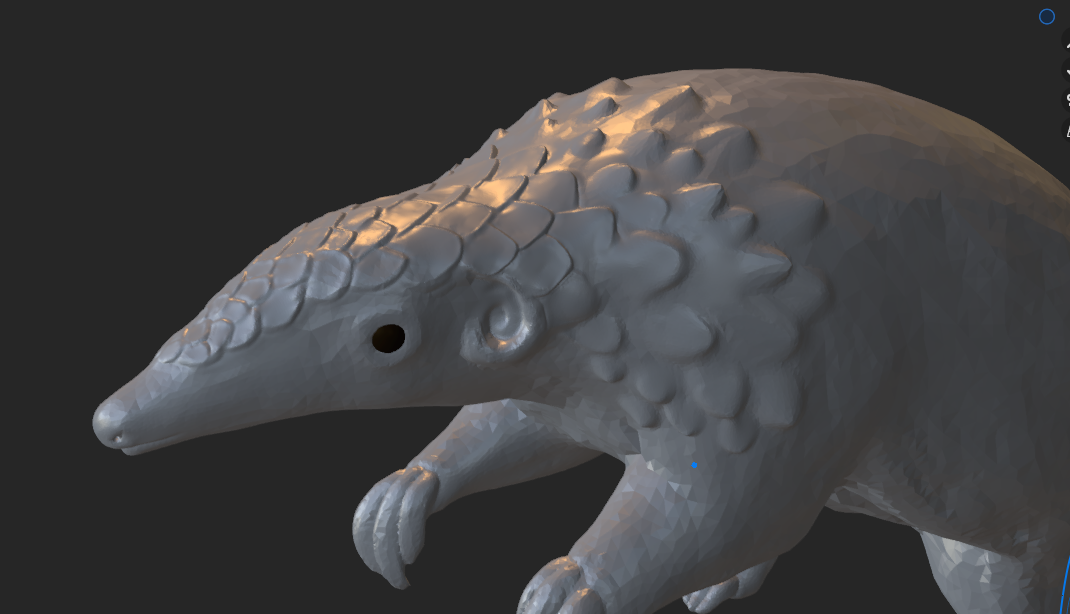 A sculpt of a pangolin partially covered by scales