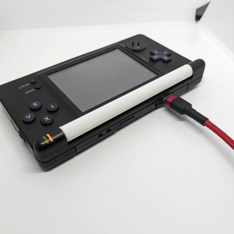 Showing the gameboy macro charging via usb c