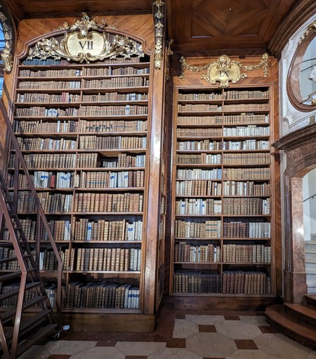 Two bookcases full of books at the state library of Austria 