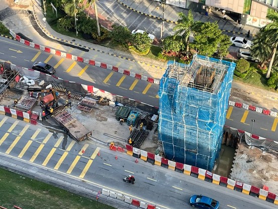 Pillar being build in the middle of the road, to support the viaduct of RTS Link.
