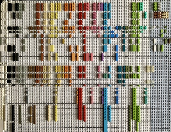 Lego Modulex bricks arranged in a grid by size and colour