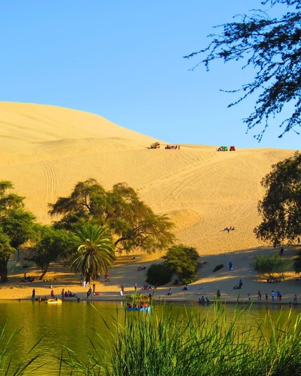 The Huacachina Oasis is a desert oasis in southwestern Peru