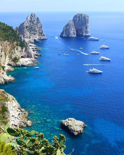Three towering rock formations in Capri, Italy