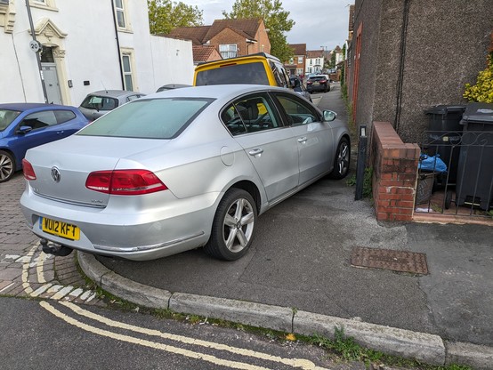 A car just fully crashed on the pavement, just totally blocking it, with not even a pretense of leaving space for pedestrians.