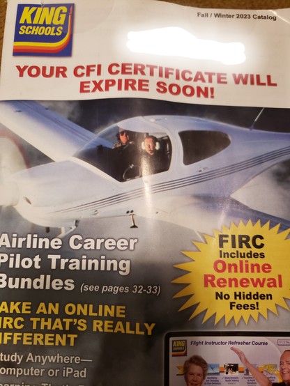 Image of a catalog from King Schools, an aviation training company. It contains the phrase, "Your CFI certificate will expire soon!" There is a picture of a white plane (possibly a Cirrus) in flight with two people in the front seats looking towards the camera.