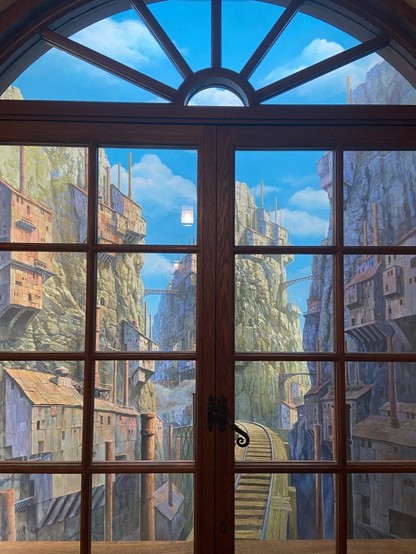 A window looking into an imaginative world created by Studio Ghibli.