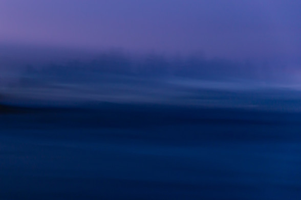 An ICM (Intentional Camera Movement) image of the treeline next to the shore at Marine Park