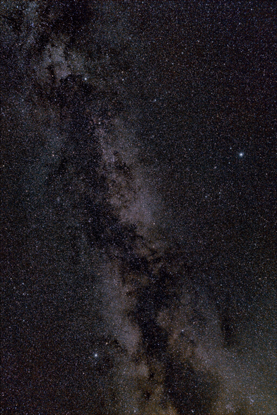 Another swath of Milky Way, through Cygnus, appearing a bit more stark, with the stars Altair, Deneb, and Vega arranged in a large triangle l