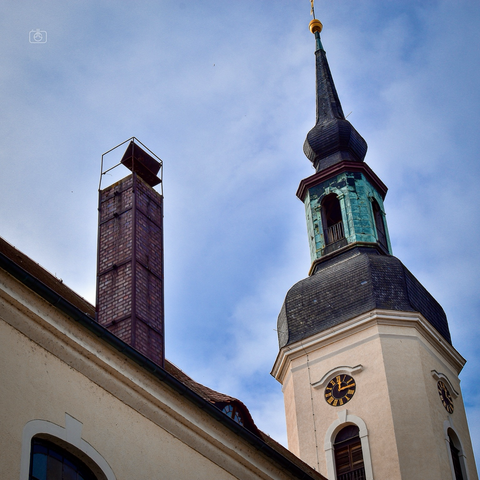 Church bell tower in Baroque style, St. Nicholas’ Church, Lübbenau, Germany, 6 Oct 2023. Nikon D5600, Nikkor DX 35 mm ƒ1.8G, ISO 100, ƒ16, 1/125s