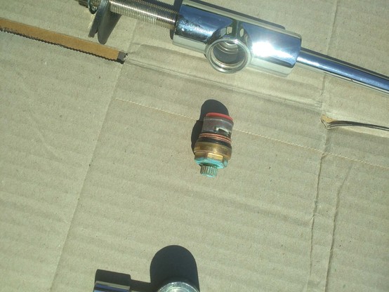 Cartridge removed from tap body.