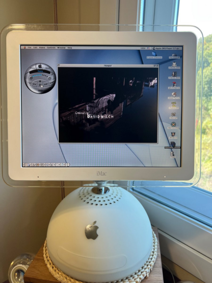 Photo showing the Deadwood intro sequence playing on-screen in the Apple DVD player application on MacOS 9.
