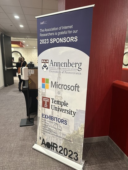 Vertical banner showing the sponsors of the AoIR 2023 conference - Annenberg School for Communication at the University of Pennsylvania, Microsoft, and Temple University. 