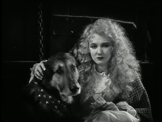 The Man Who Laughs, 1928; Zimbo (Homo the Dog) & Mary Philbin (Dea)