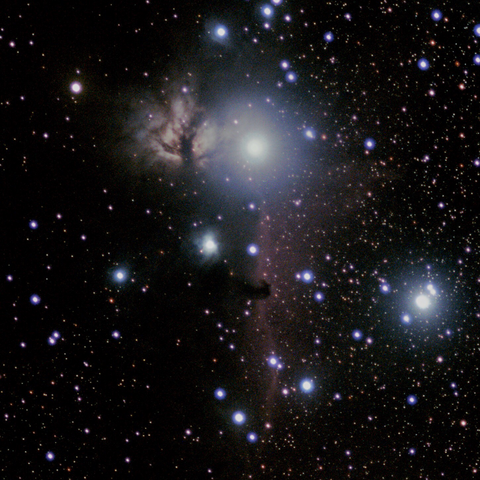 Two colorful nebulae and many stars against a black background, more details in following photos 
