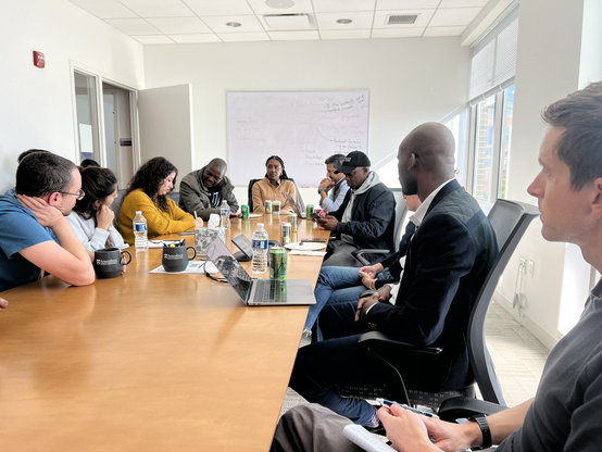 A pic of a crowded conference table