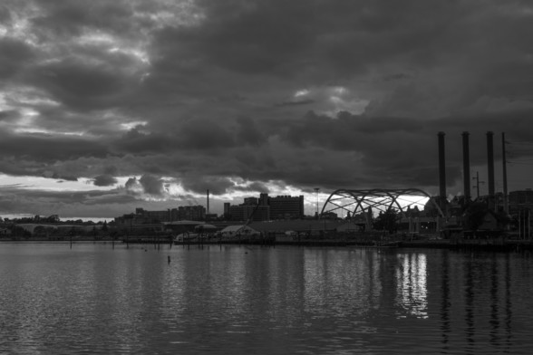 Pentax K3miii Monochrome 
Providence over the bay with the sun setting behind the power plant.